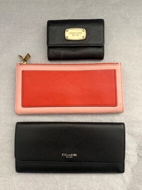 lot of wallets-coach,Fossil,Michael Kors